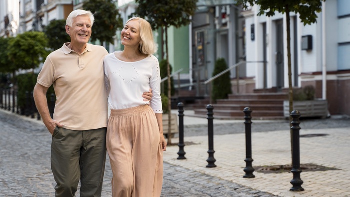 A couple over 50 enjoying a walk together