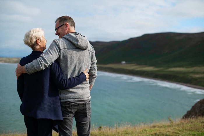 Older couple overlooking the coast near St Austell
