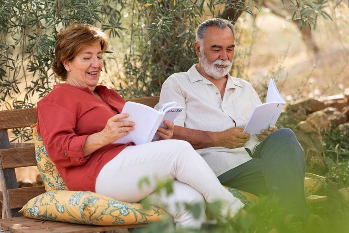 Mature couple on a garden bench in Laguna Niguel
