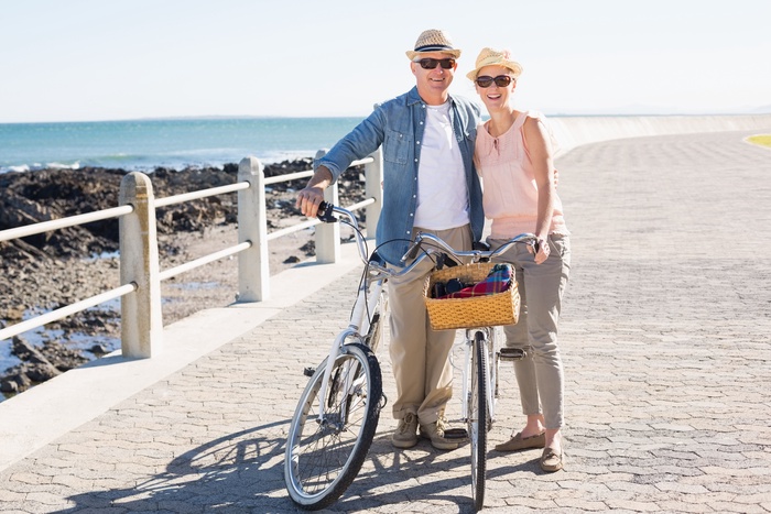 A mature couple spending time together by the waterfront, reflecting coastal senior dating in Portland, Maine.