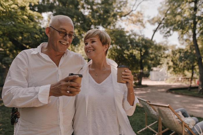 Mature couple walking near Freedom Lake Park