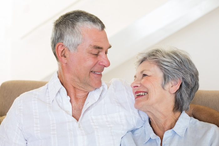 Senior couple enjoying a warm moment together, representing companionship and dating over 50 in Mt. Pleasant, South Carolina.