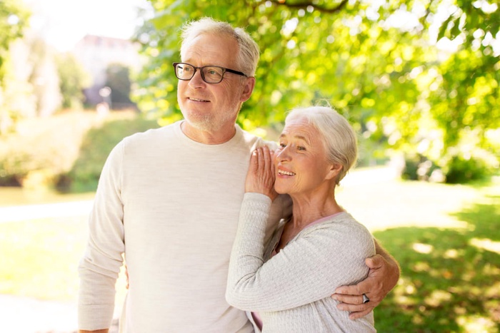 happy senior couple in the garden
