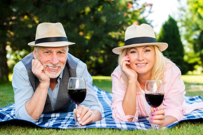 Mature couple enjoying a picnic in a Meridian Idaho park
