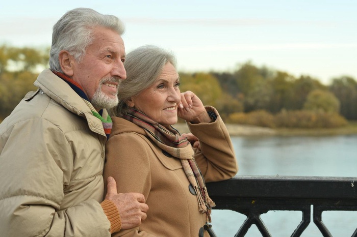 Senior couple enjoying a waterfront walk in Chatham, Ontario