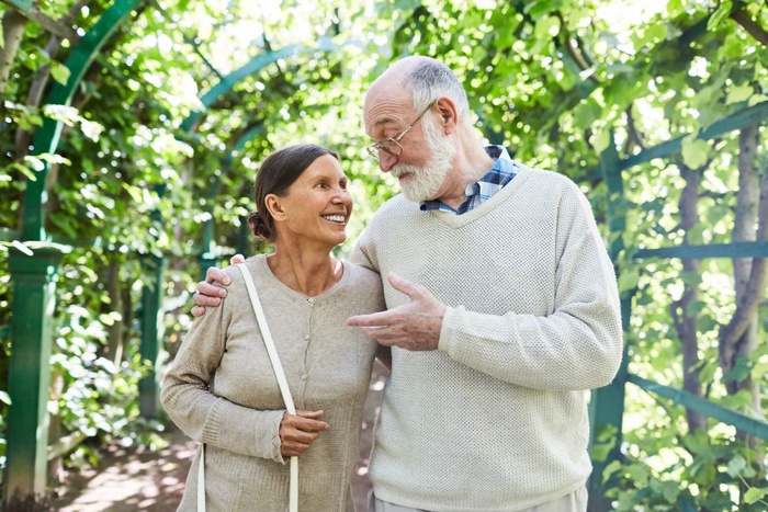 Mature couple enjoying a garden walk in Mount Gambier