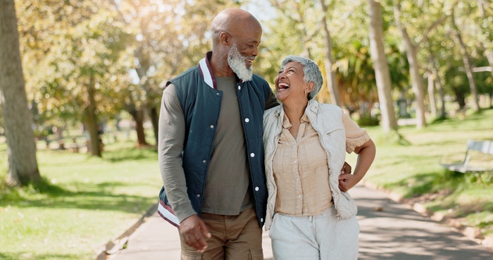 A mature couple enjoying a walk together, reflecting active senior dating for singles over 50 in Akron, Ohio.