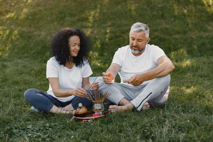 Mature couple enjoying a relaxed outdoor picnic