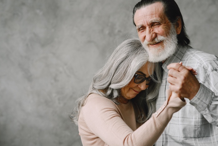 Older couple talking during a relaxed outing in an open rural setting near Acton, California