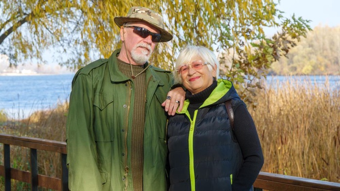 Senior couple standing together by the water at Presque Isle State Park in Erie, Pennsylvania
