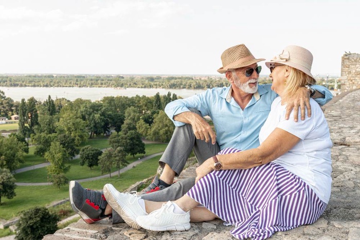 Older couple relaxing together on an outdoor date