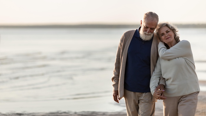 Senior couple walking outdoors