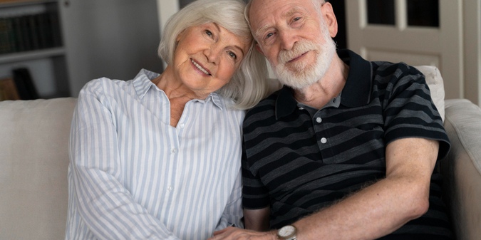 Couple over 50 enjoying time together at home