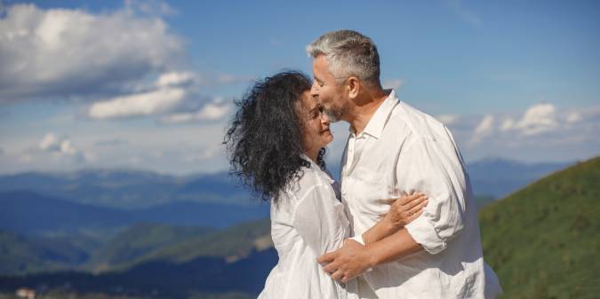 Senior couple embracing outdoors