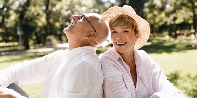 Happy senior couple relaxing in the park