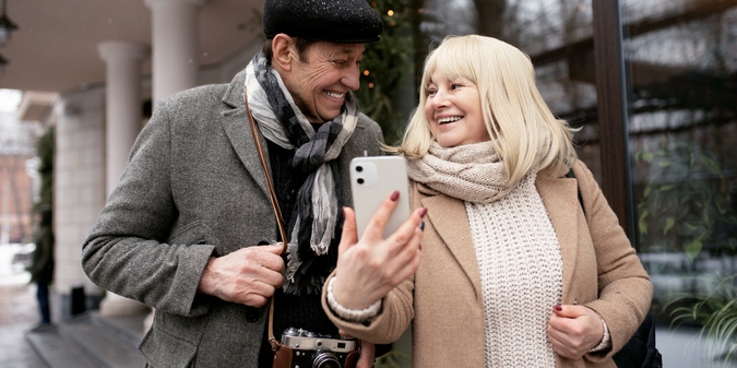 Mature couple enjoying a winter walk in the city